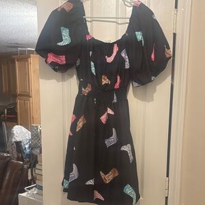 Chic Black Mini Dress with Colorful Boot Design